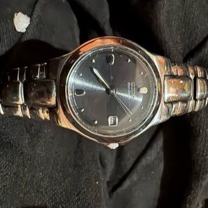 Citizen Eco-Drive Ladies Watch Black Dial WR100 Date Window Stainless Bracelet